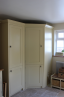 Angled Cupboard to House Boiler with Integrated Fridge Freezer